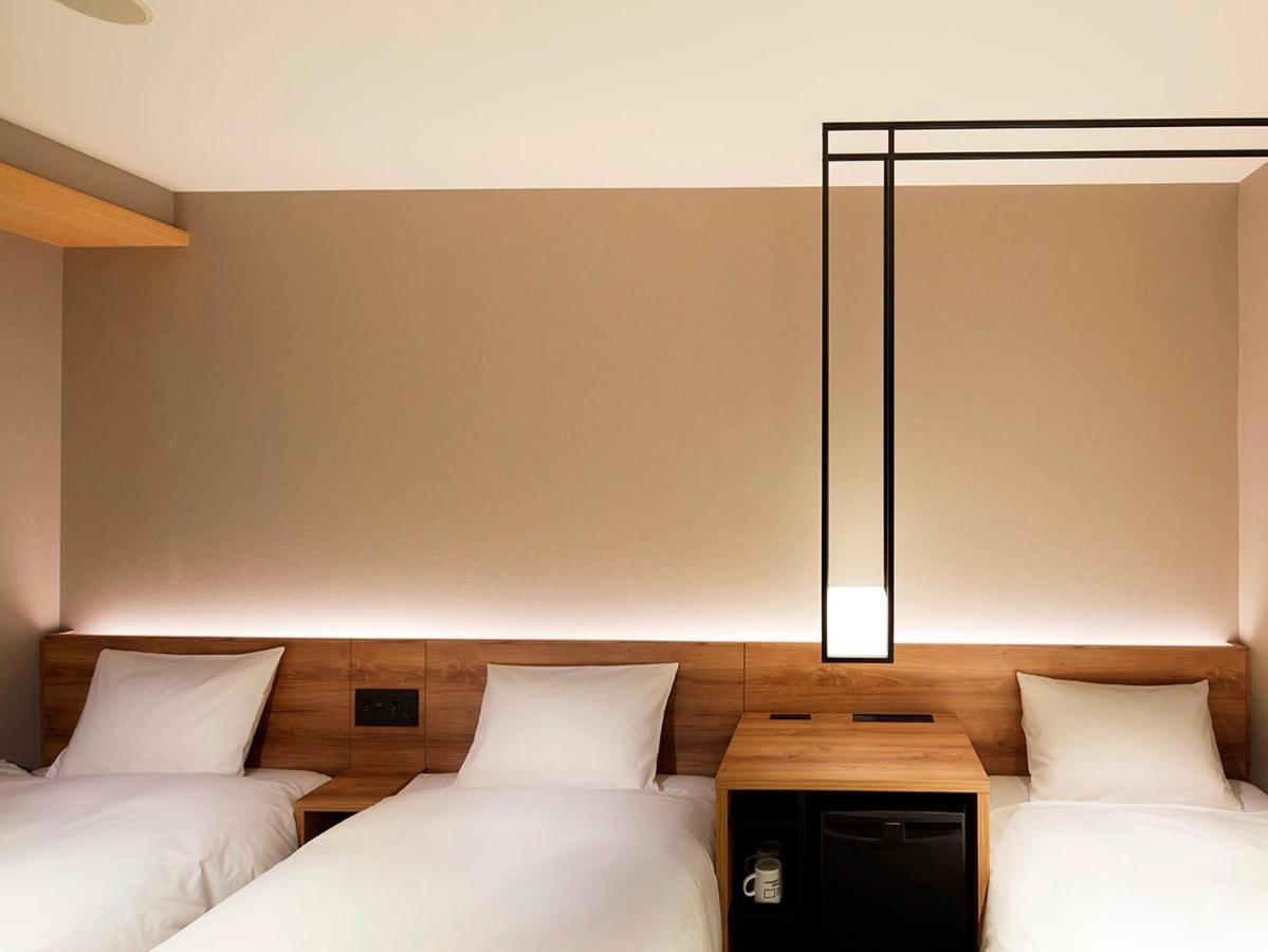 Hotel Androoms Shin-Osaka Rum bild